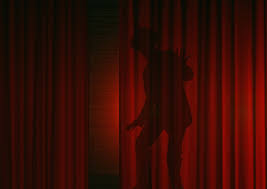 man-behind-curtain